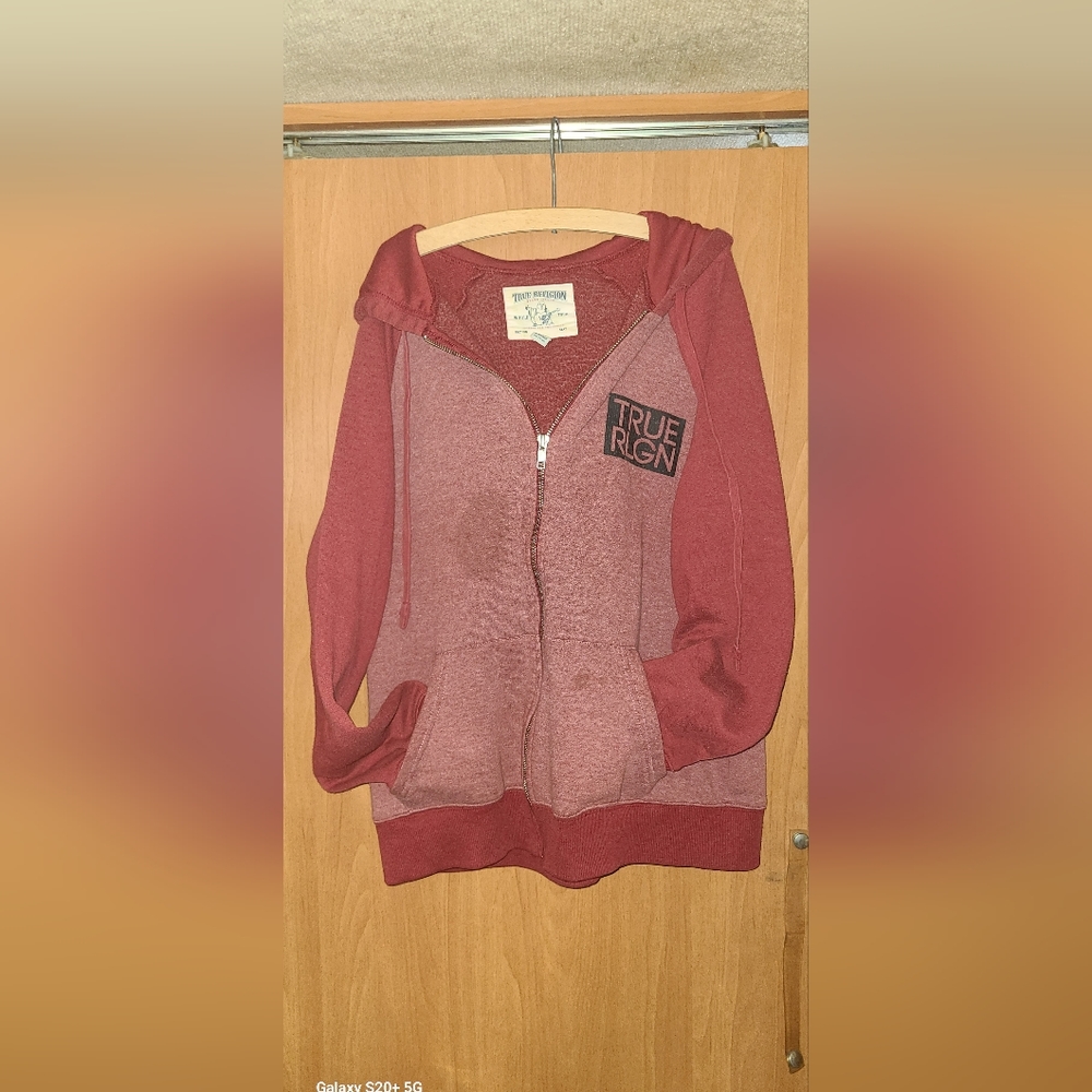 True, religion sweatshirt.
